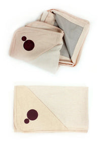 Folded Belly Armor organic cotton belly blankets showing embroidered logo and lining