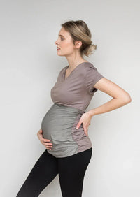 Side view of a gray Belly Armor ruched maternity tee with belly panel